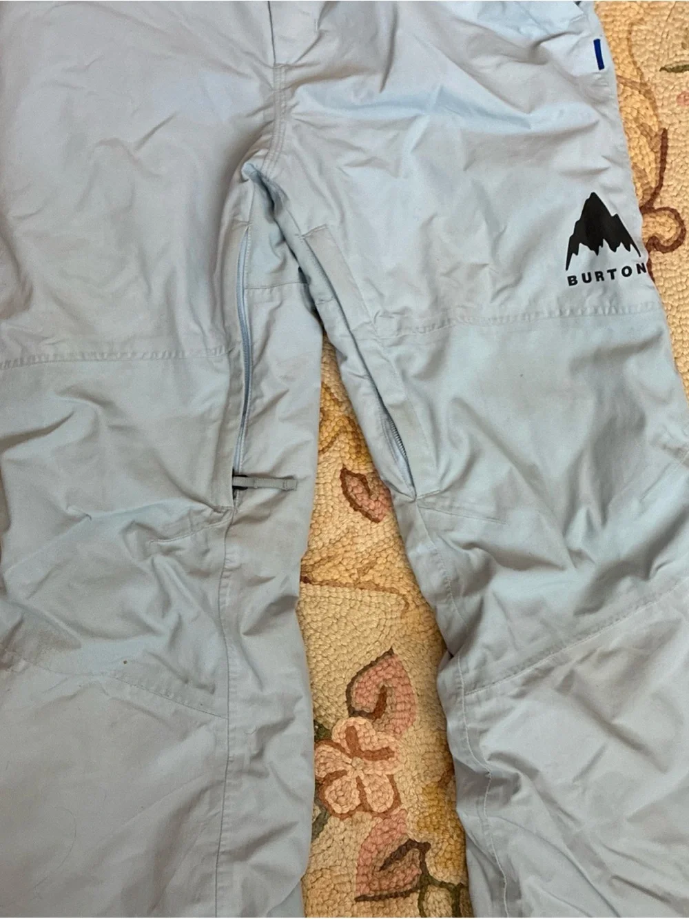 Burton Light Blue Snow Bibs Girls Size 10.  “Room to grow” feature.